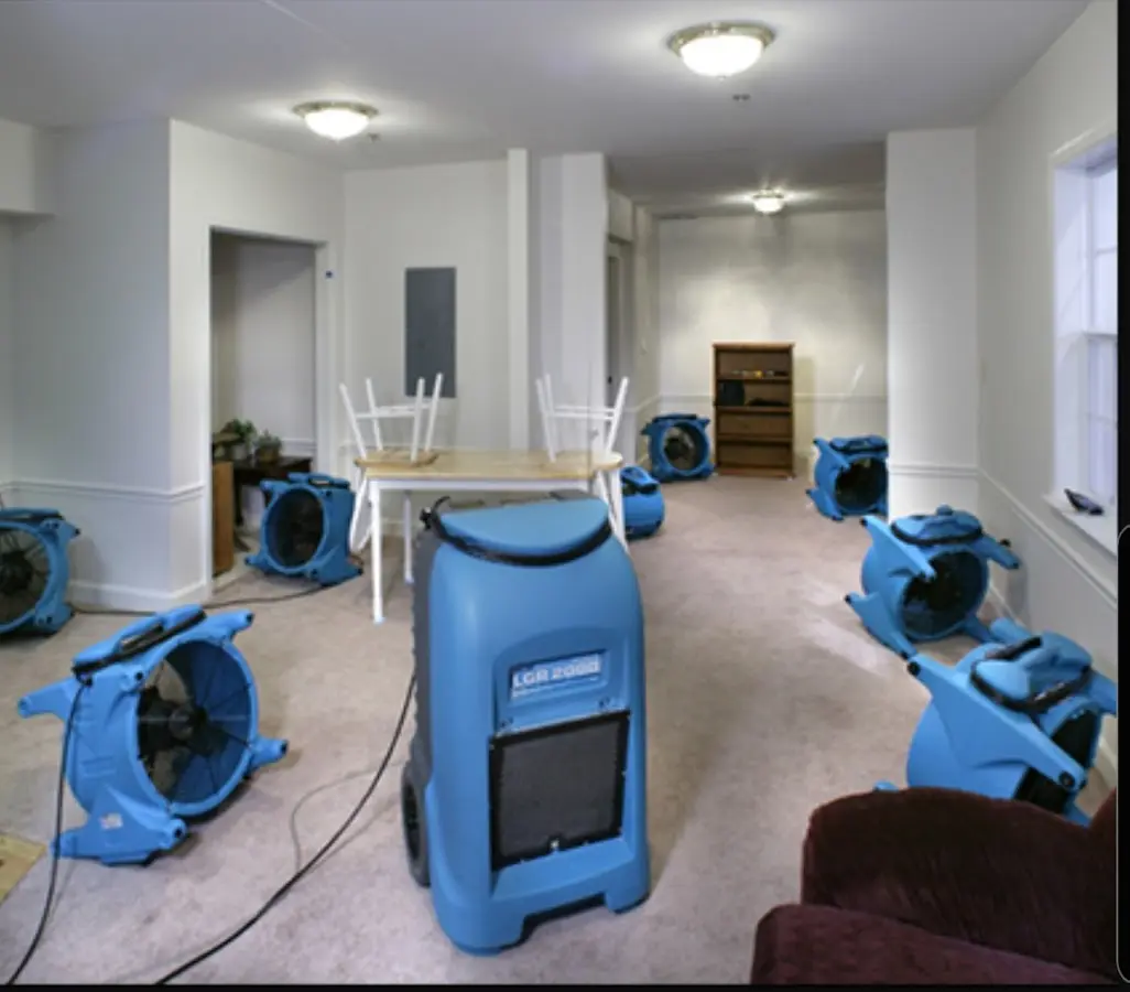 Air movers and dehumidifier setup for Water Damage Restoration in Belgrade